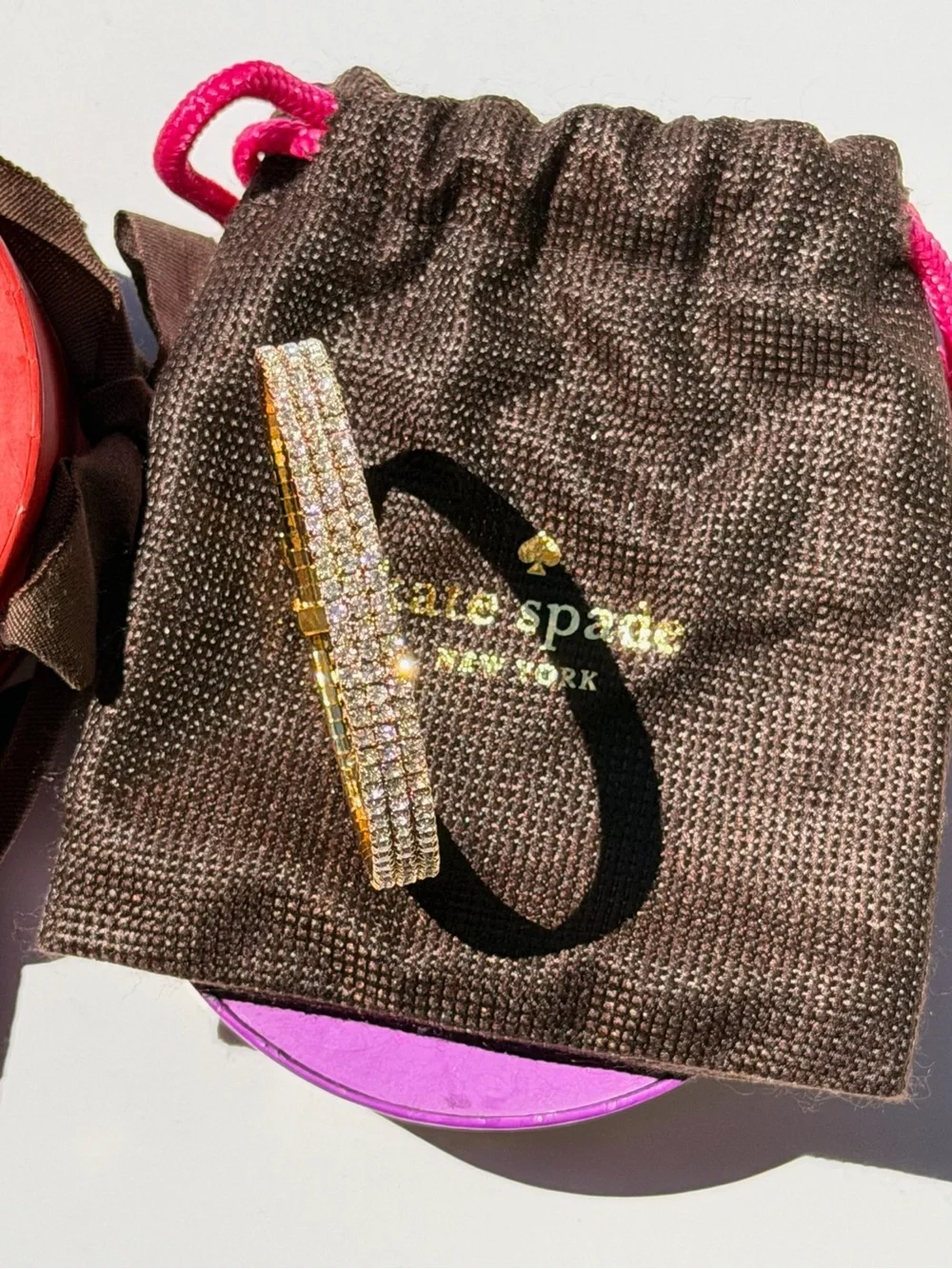 kate spade Gold Crystal Lock Bracelet with Pink Lining